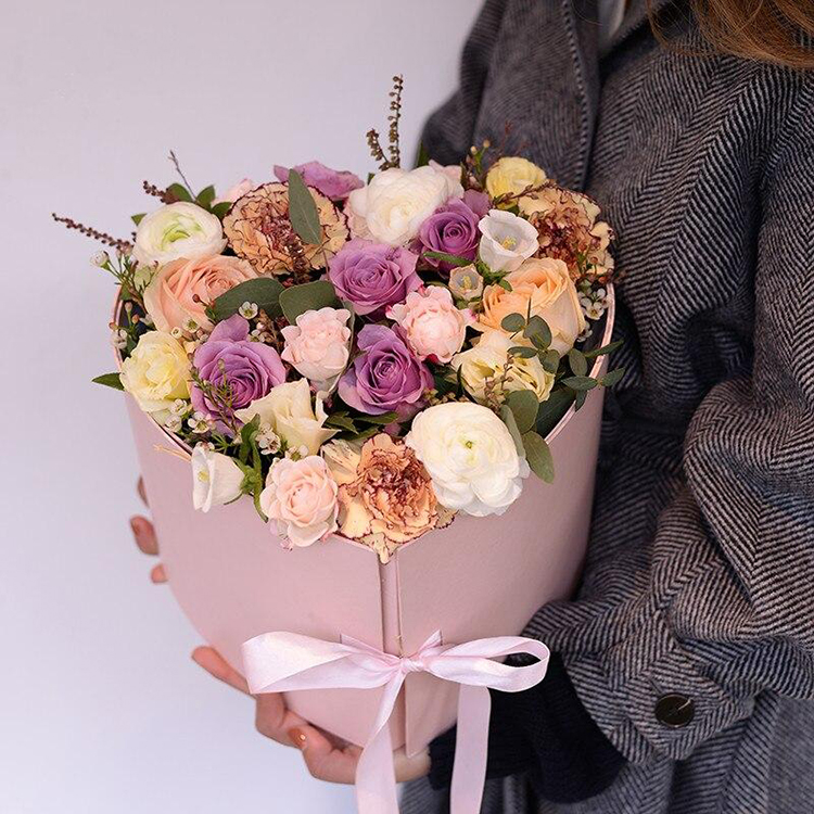 Pink heart flower box with ribbon